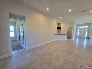 Live Where Others Vacation - Experience peaceful golf course on Twisted Oaks Golf Club in Florida - for sale on GolfHomes.com, golf home, golf lot