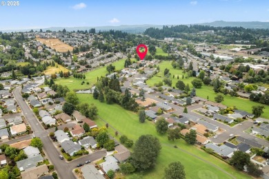 Discover your dream home nestled in a serene cul-de-sac on King City Golf Course in Oregon - for sale on GolfHomes.com, golf home, golf lot