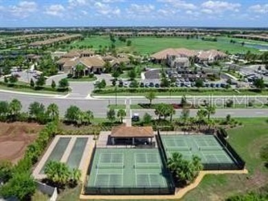 Golf, sunsets, and a 6-seater golf cart--all included!

 on Lakewood National Golf Club in Florida - for sale on GolfHomes.com, golf home, golf lot