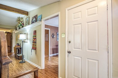 This charming home is on a corner lot with common property on on DeSoto Golf Course in Arkansas - for sale on GolfHomes.com, golf home, golf lot