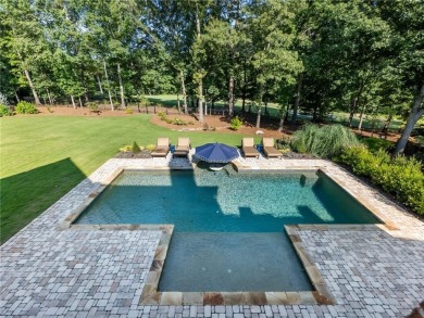 Set on a private lot overlooking the 7th green of the on Chateau Elan Golf Club  in Georgia - for sale on GolfHomes.com, golf home, golf lot