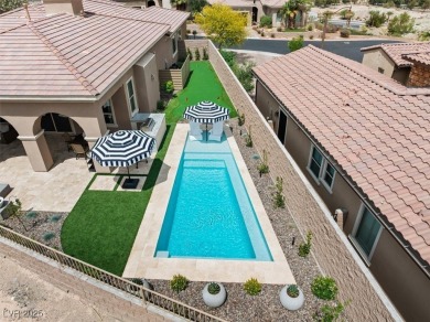 Experience resort-style living in this luxurious single-story on South Shore At Lake Las Vegas in Nevada - for sale on GolfHomes.com, golf home, golf lot