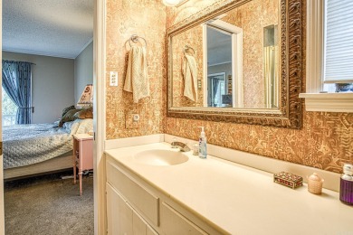 This charming home is on a corner lot with common property on on DeSoto Golf Course in Arkansas - for sale on GolfHomes.com, golf home, golf lot