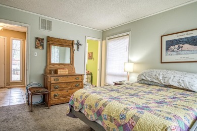 This charming home is on a corner lot with common property on on DeSoto Golf Course in Arkansas - for sale on GolfHomes.com, golf home, golf lot
