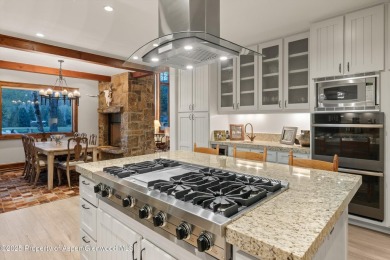 Tucked away for off-street privacy and backing right up to the on Aspen Golf Club in Colorado - for sale on GolfHomes.com, golf home, golf lot