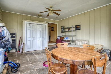 This charming home is on a corner lot with common property on on DeSoto Golf Course in Arkansas - for sale on GolfHomes.com, golf home, golf lot