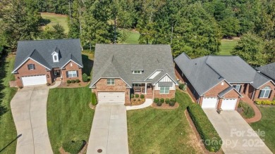 Take a look at this stunning, well maintained brick home on Cowans Ford Country Club in North Carolina - for sale on GolfHomes.com, golf home, golf lot