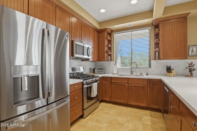 Located in the sought-after Mirage Trail condominium enclave on Legend Trail Golf Club in Arizona - for sale on GolfHomes.com, golf home, golf lot