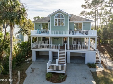 Discover your dream coastal retreat with this stunning reverse on Ocean Creek Golf Course in South Carolina - for sale on GolfHomes.com, golf home, golf lot