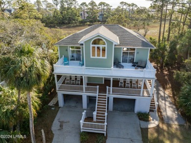 Discover your dream coastal retreat with this stunning reverse on Ocean Creek Golf Course in South Carolina - for sale on GolfHomes.com, golf home, golf lot