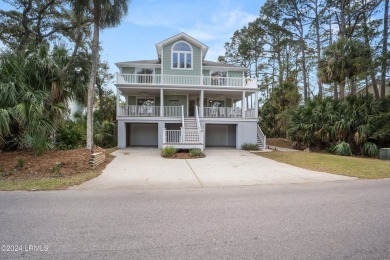 Discover your dream coastal retreat with this stunning reverse on Ocean Creek Golf Course in South Carolina - for sale on GolfHomes.com, golf home, golf lot