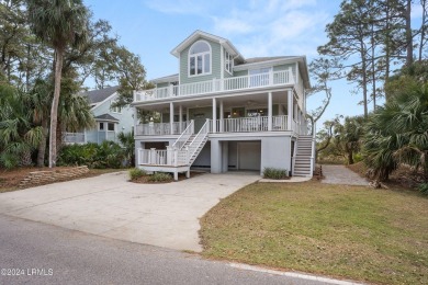 Discover your dream coastal retreat with this stunning reverse on Ocean Creek Golf Course in South Carolina - for sale on GolfHomes.com, golf home, golf lot