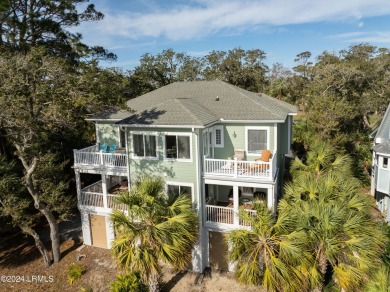 Discover your dream coastal retreat with this stunning reverse on Ocean Creek Golf Course in South Carolina - for sale on GolfHomes.com, golf home, golf lot