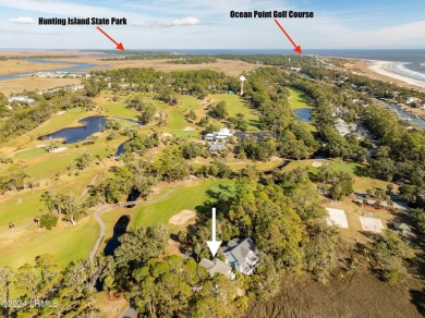 Discover your dream coastal retreat with this stunning reverse on Ocean Creek Golf Course in South Carolina - for sale on GolfHomes.com, golf home, golf lot