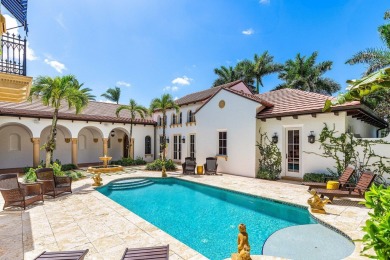 This custom built 4 bedroom, 4.5 bath exquisite courtyard home on Old Marsh Golf Club in Florida - for sale on GolfHomes.com, golf home, golf lot