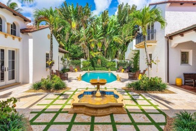 This custom built 4 bedroom, 4.5 bath exquisite courtyard home on Old Marsh Golf Club in Florida - for sale on GolfHomes.com, golf home, golf lot