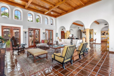 This custom built 4 bedroom, 4.5 bath exquisite courtyard home on Old Marsh Golf Club in Florida - for sale on GolfHomes.com, golf home, golf lot