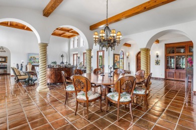 This custom built 4 bedroom, 4.5 bath exquisite courtyard home on Old Marsh Golf Club in Florida - for sale on GolfHomes.com, golf home, golf lot