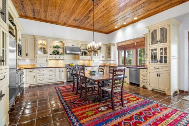 This custom built 4 bedroom, 4.5 bath exquisite courtyard home on Old Marsh Golf Club in Florida - for sale on GolfHomes.com, golf home, golf lot