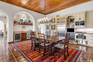 This custom built 4 bedroom, 4.5 bath exquisite courtyard home on Old Marsh Golf Club in Florida - for sale on GolfHomes.com, golf home, golf lot