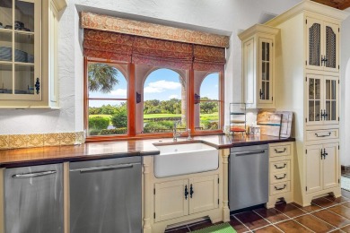 This custom built 4 bedroom, 4.5 bath exquisite courtyard home on Old Marsh Golf Club in Florida - for sale on GolfHomes.com, golf home, golf lot