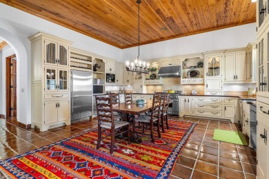 This custom built 4 bedroom, 4.5 bath exquisite courtyard home on Old Marsh Golf Club in Florida - for sale on GolfHomes.com, golf home, golf lot