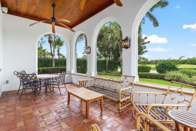 This custom built 4 bedroom, 4.5 bath exquisite courtyard home on Old Marsh Golf Club in Florida - for sale on GolfHomes.com, golf home, golf lot