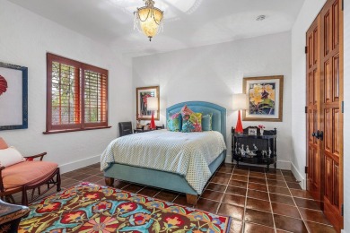 This custom built 4 bedroom, 4.5 bath exquisite courtyard home on Old Marsh Golf Club in Florida - for sale on GolfHomes.com, golf home, golf lot