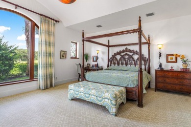 This custom built 4 bedroom, 4.5 bath exquisite courtyard home on Old Marsh Golf Club in Florida - for sale on GolfHomes.com, golf home, golf lot