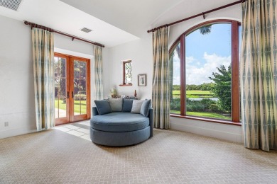 This custom built 4 bedroom, 4.5 bath exquisite courtyard home on Old Marsh Golf Club in Florida - for sale on GolfHomes.com, golf home, golf lot