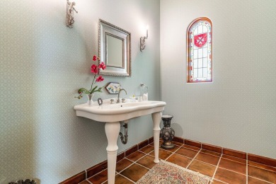 This custom built 4 bedroom, 4.5 bath exquisite courtyard home on Old Marsh Golf Club in Florida - for sale on GolfHomes.com, golf home, golf lot