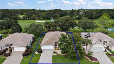 Welcome to this stunning 3/2 GOLF FRONT TURNKEY Gardenia Model on The Links of Spruce Creek in Florida - for sale on GolfHomes.com, golf home, golf lot