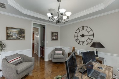 Welcome to this spacious and well-maintained 5-bedroom, 3-bath on Hampton Golf Village in Georgia - for sale on GolfHomes.com, golf home, golf lot