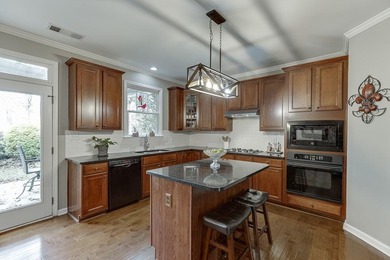 Welcome to this spacious and well-maintained 5-bedroom, 3-bath on Hampton Golf Village in Georgia - for sale on GolfHomes.com, golf home, golf lot