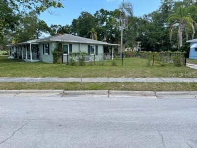Solid concrete block Duplex on a large lot. Close to Downtown on Belleair Country Club in Florida - for sale on GolfHomes.com, golf home, golf lot