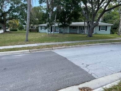 Solid concrete block Duplex on a large lot. Close to Downtown on Belleair Country Club in Florida - for sale on GolfHomes.com, golf home, golf lot
