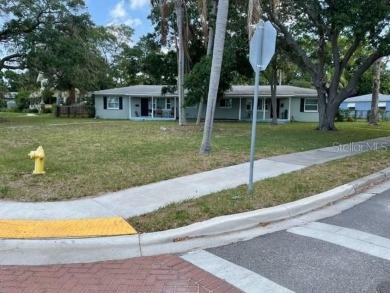 Solid concrete block Duplex on a large lot. Close to Downtown on Belleair Country Club in Florida - for sale on GolfHomes.com, golf home, golf lot