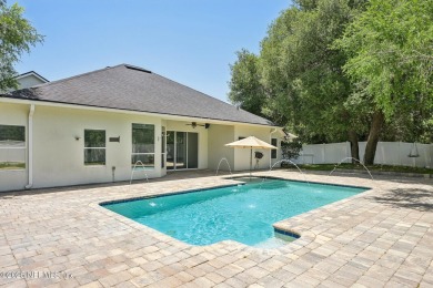 Motivated sellers welcome you to this immaculate 5BR/4BA pool on King and Bear Golf Course/World Golf Village in Florida - for sale on GolfHomes.com, golf home, golf lot