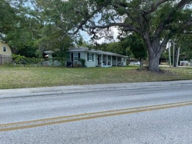 Solid concrete block Duplex on a large lot. Close to Downtown on Belleair Country Club in Florida - for sale on GolfHomes.com, golf home, golf lot
