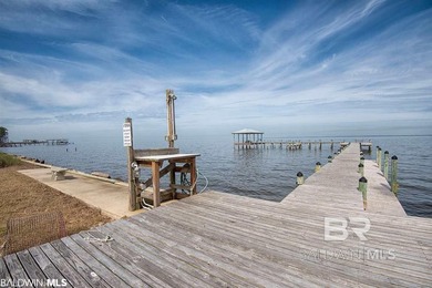 Are you seeking a tranquil escape to build your dream home? Look on Peninsula Golf and Racquet Club in Alabama - for sale on GolfHomes.com, golf home, golf lot