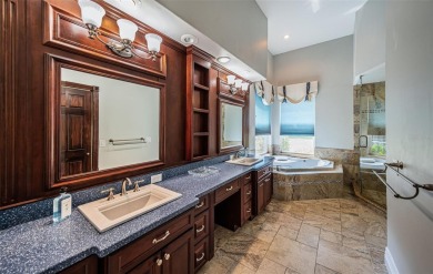 Trying to downsize but don't want to feel cramped? Step into the on East Lake Woodlands Country Club in Florida - for sale on GolfHomes.com, golf home, golf lot