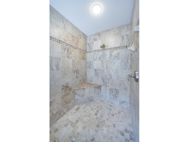 Trying to downsize but don't want to feel cramped? Step into the on East Lake Woodlands Country Club in Florida - for sale on GolfHomes.com, golf home, golf lot