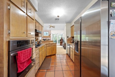 Lamar Peninsula Retreat under Majestic Coastal Oaks.  Nestled on Lamar Golf Course in Texas - for sale on GolfHomes.com, golf home, golf lot