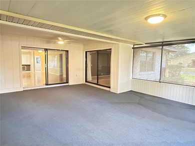 MOVE IN CONDITION!  Nestled on a beautifully landscaped and tree on Cypresswood Golf and Country Club in Florida - for sale on GolfHomes.com, golf home, golf lot