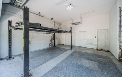 Trying to downsize but don't want to feel cramped? Step into the on East Lake Woodlands Country Club in Florida - for sale on GolfHomes.com, golf home, golf lot