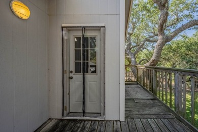 Lamar Peninsula Retreat under Majestic Coastal Oaks.  Nestled on Lamar Golf Course in Texas - for sale on GolfHomes.com, golf home, golf lot