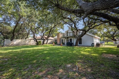 Lamar Peninsula Retreat under Majestic Coastal Oaks.  Nestled on Lamar Golf Course in Texas - for sale on GolfHomes.com, golf home, golf lot
