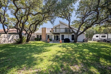 Lamar Peninsula Retreat under Majestic Coastal Oaks.  Nestled on Lamar Golf Course in Texas - for sale on GolfHomes.com, golf home, golf lot