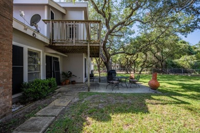 Lamar Peninsula Retreat under Majestic Coastal Oaks.  Nestled on Lamar Golf Course in Texas - for sale on GolfHomes.com, golf home, golf lot