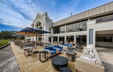 Trying to downsize but don't want to feel cramped? Step into the on East Lake Woodlands Country Club in Florida - for sale on GolfHomes.com, golf home, golf lot